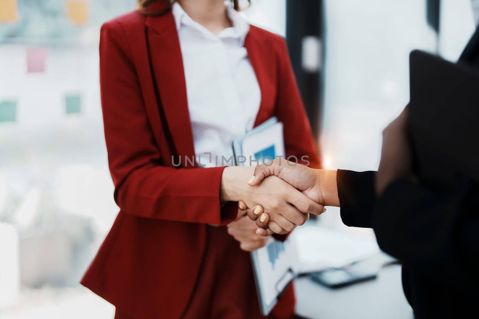 Multi ethnic business Financial shaking hands, Successful businessmen handshaking after good deal. business Finishing up meeting contract concept by Manastrong