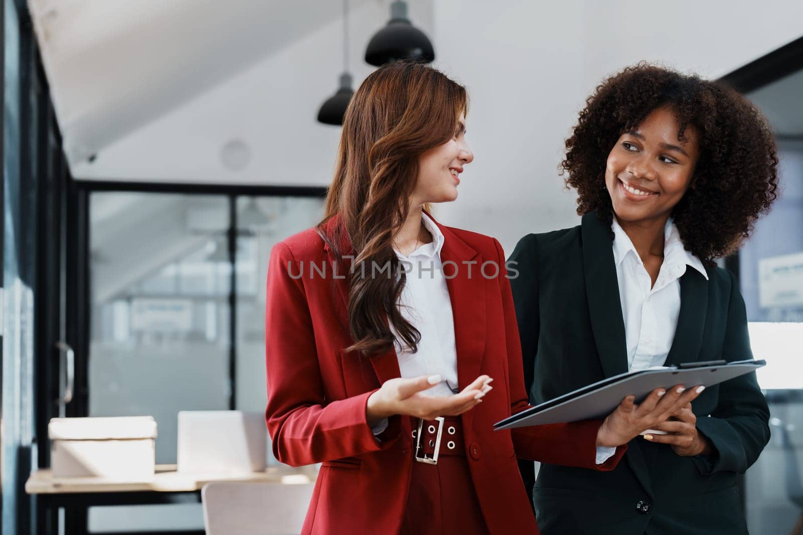 Multiethnic business, Beautiful American African with asian businesswomans people in meeting. Accountant people do document, tax, exchange, accounting and Financial advisor.