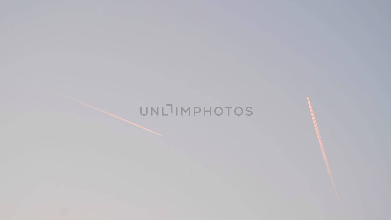 Tracks of planes in the blue sky