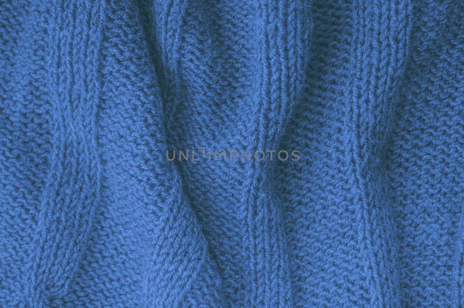 Detail Knitted Sweater. Organic Woven Pullover. Handmade Winter Background. Structure Knitted Sweater. Blue Closeup Thread. Nordic Warm Cloth. Soft Plaid Cashmere. Knitted Blanket.