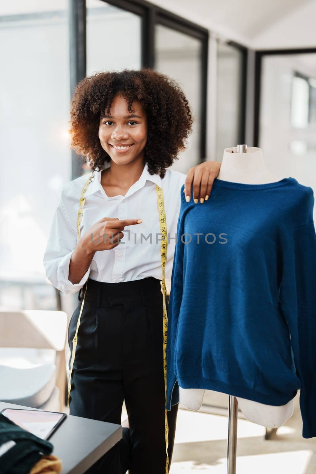 Multi ethnic young teen african american and asian woman fashion designer stylish and friend working at fashion Business studio.