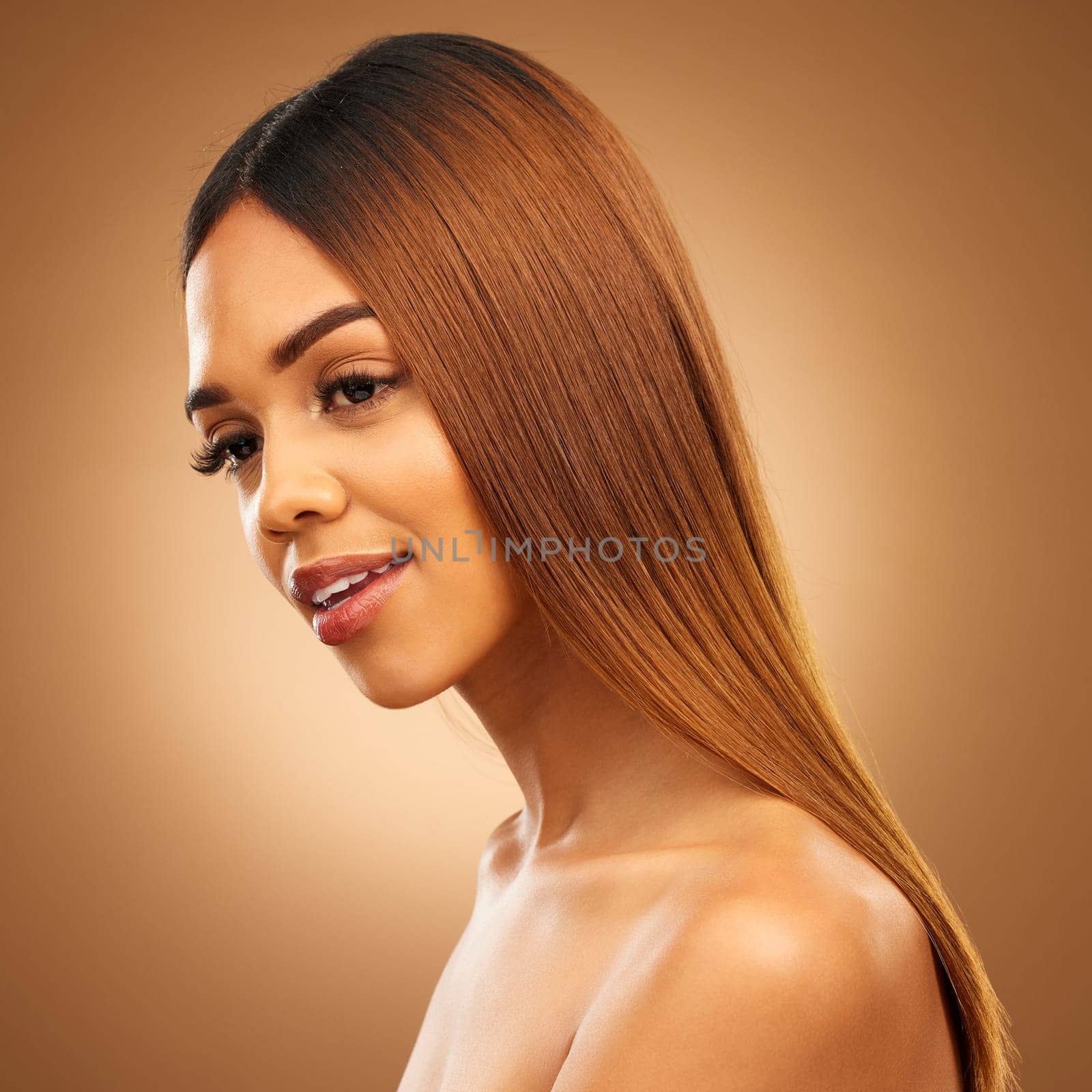 Haircare, beauty and face of woman in studio for growth and color shine or healthy texture. Female style for hair self care, natural make up and hairdresser or salon profile on brown background.