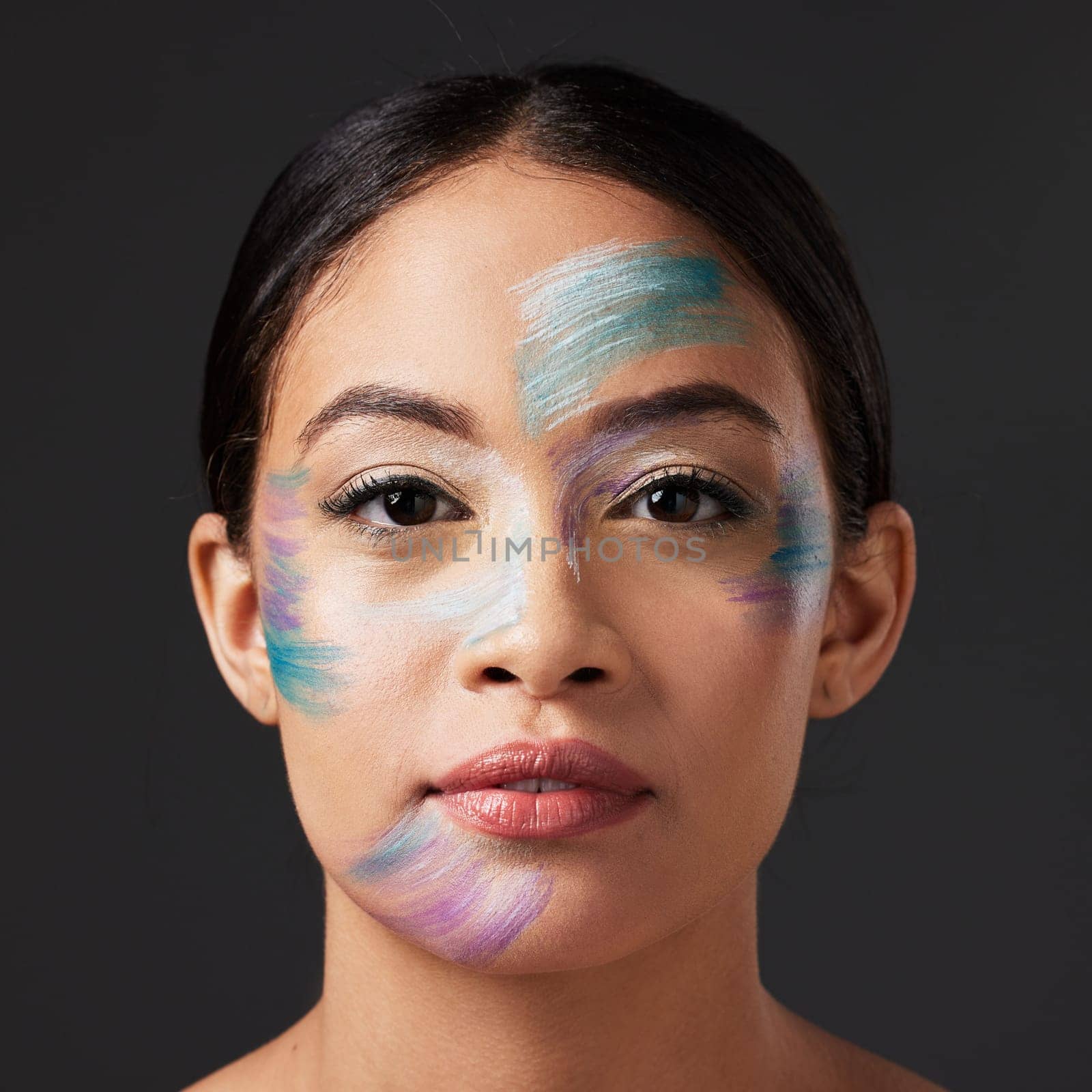 Art, aesthetic and portrait of woman with face paint, creative makeup and self expression. Beauty, creativity and color in artistic cosmetics, skincare and freedom to express for young beautiful girl.