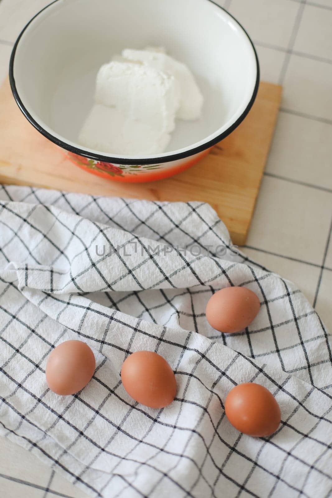 Top view of raw chicken eggs and cheese on table, cooking and making breakfast concept. High quality photo