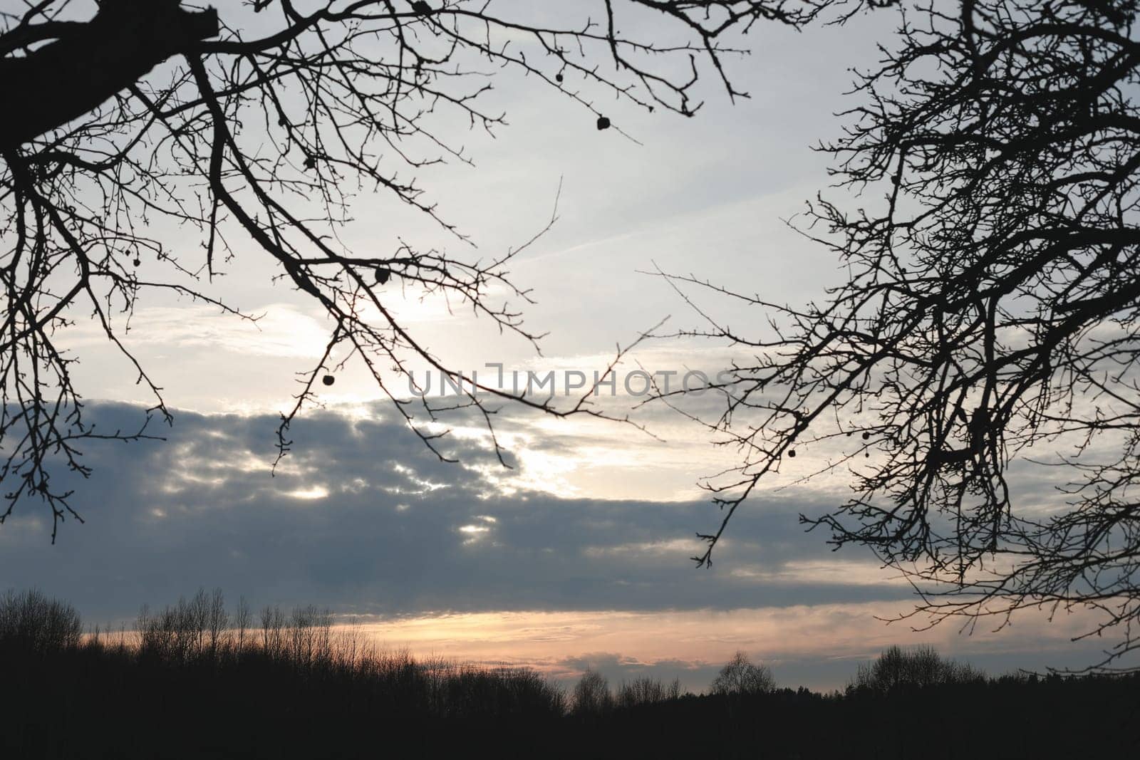 Natural sunset or sunrise. Bright dramatic Sky. Countryside Landscape under Scenic Colorful Sky at Sunset. Sun over skyline, Horizon