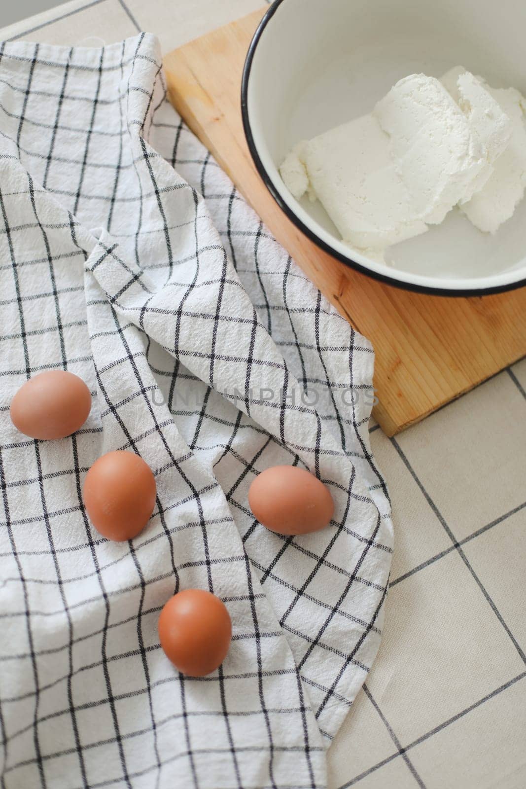 Top view of raw chicken eggs and cheese on table, cooking and making breakfast concept. High quality photo
