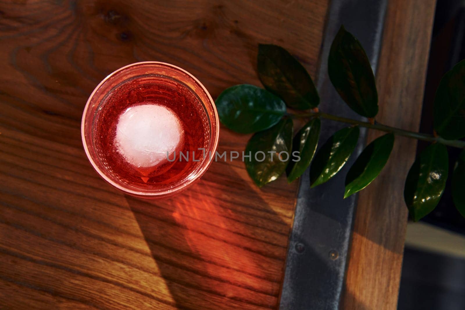 Close up view of fresh summer cocktail on the wooden table.