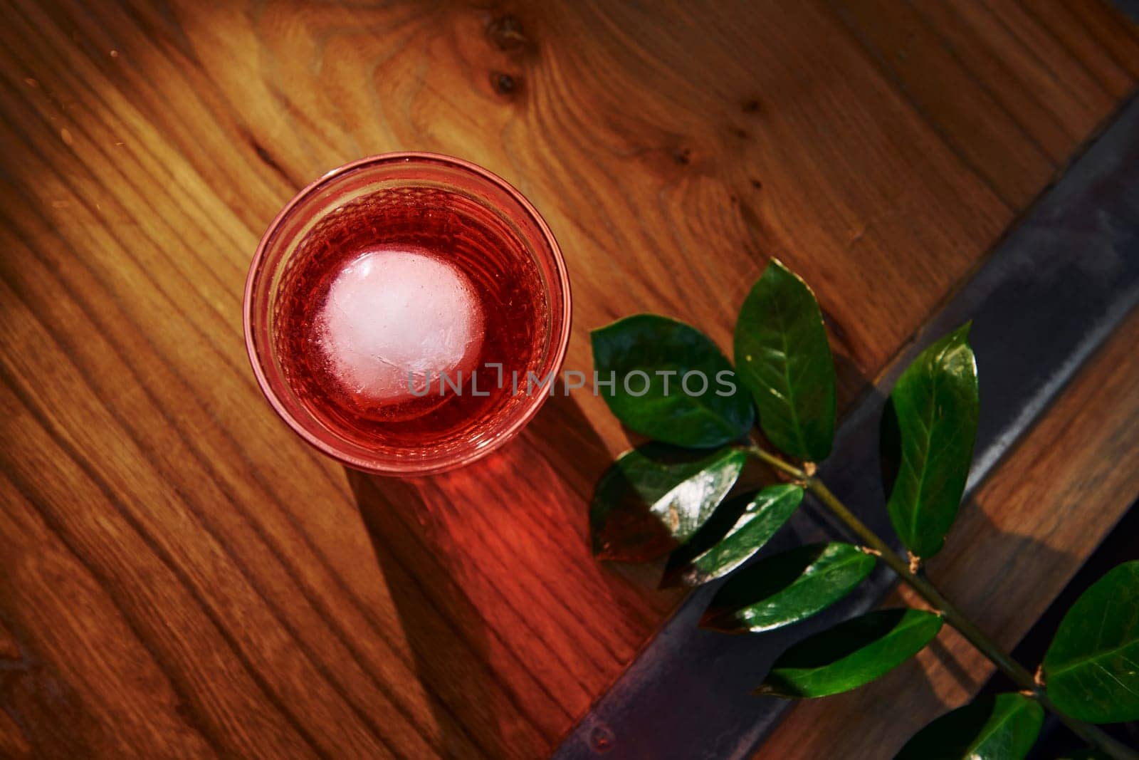 Close up view of fresh summer cocktail on the wooden table.