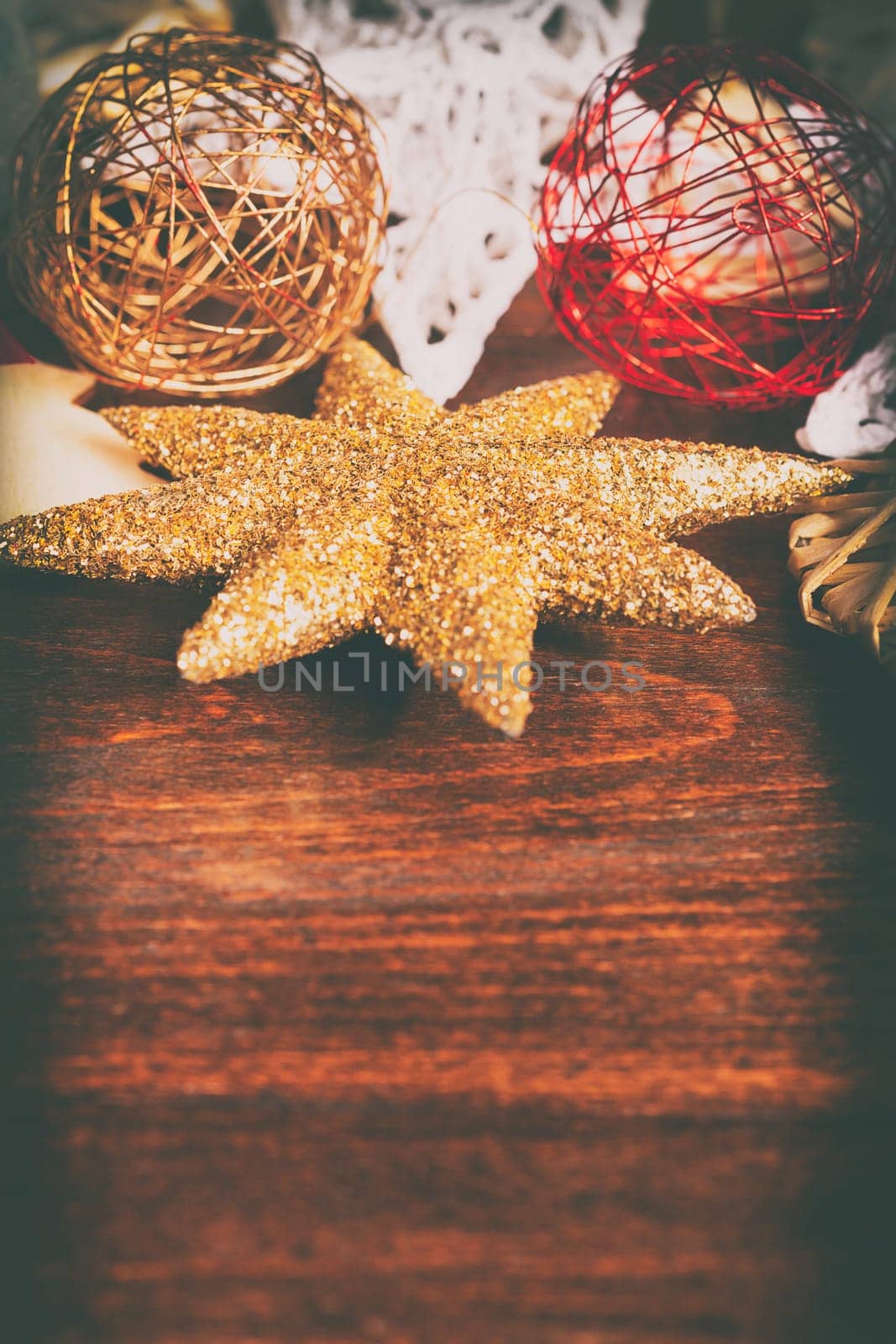 Christmas star and other ornaments in vintage toning by DCStudio