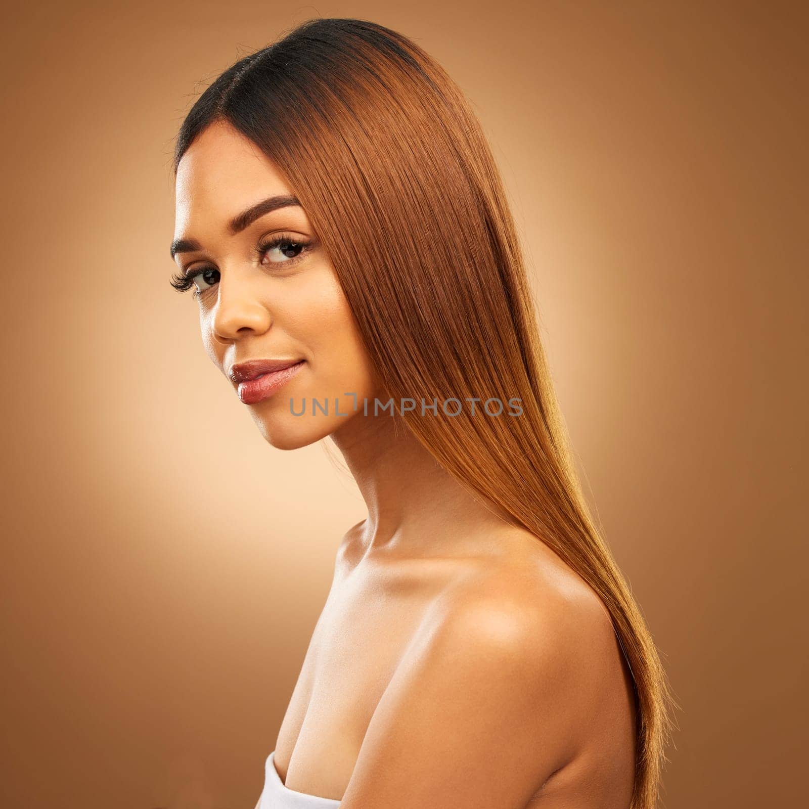 Brown hair, beauty and portrait of woman in studio for growth and color shine or healthy texture. Aesthetic female model for haircare, natural makeup and hairdresser or salon on gradient background by YuriArcurs