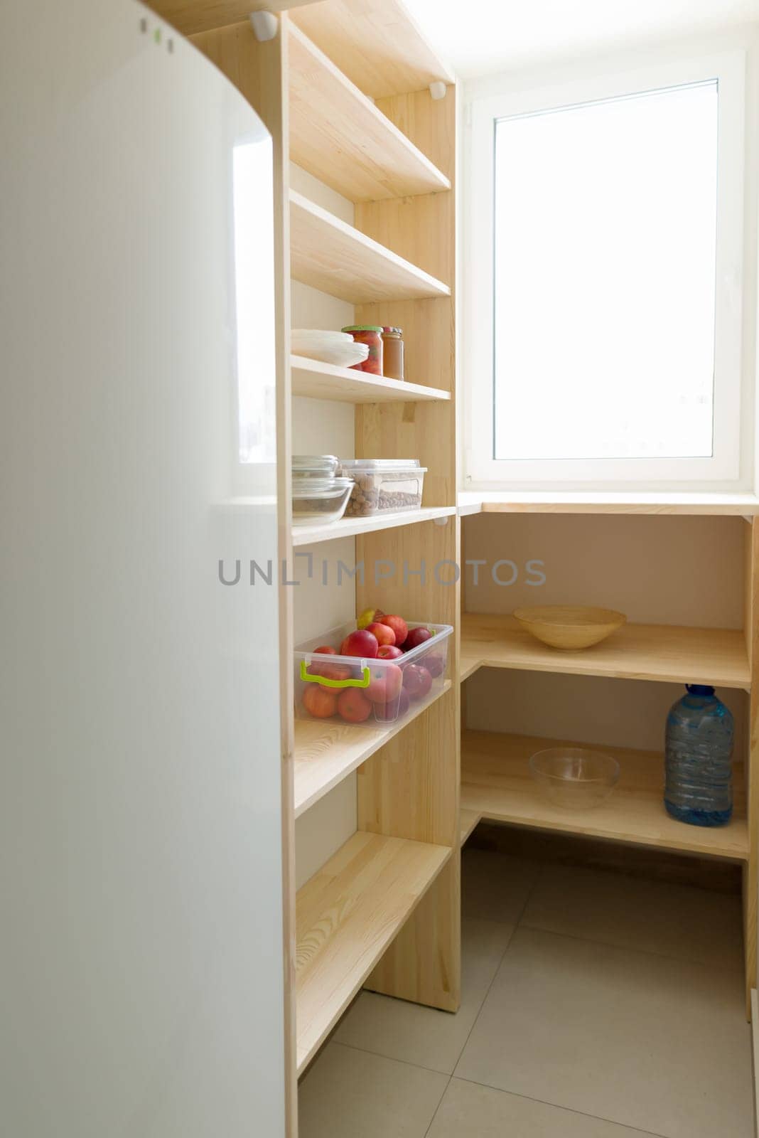 Food storage, wooden shelves in the pantry, kitchen utensils by VH-studio