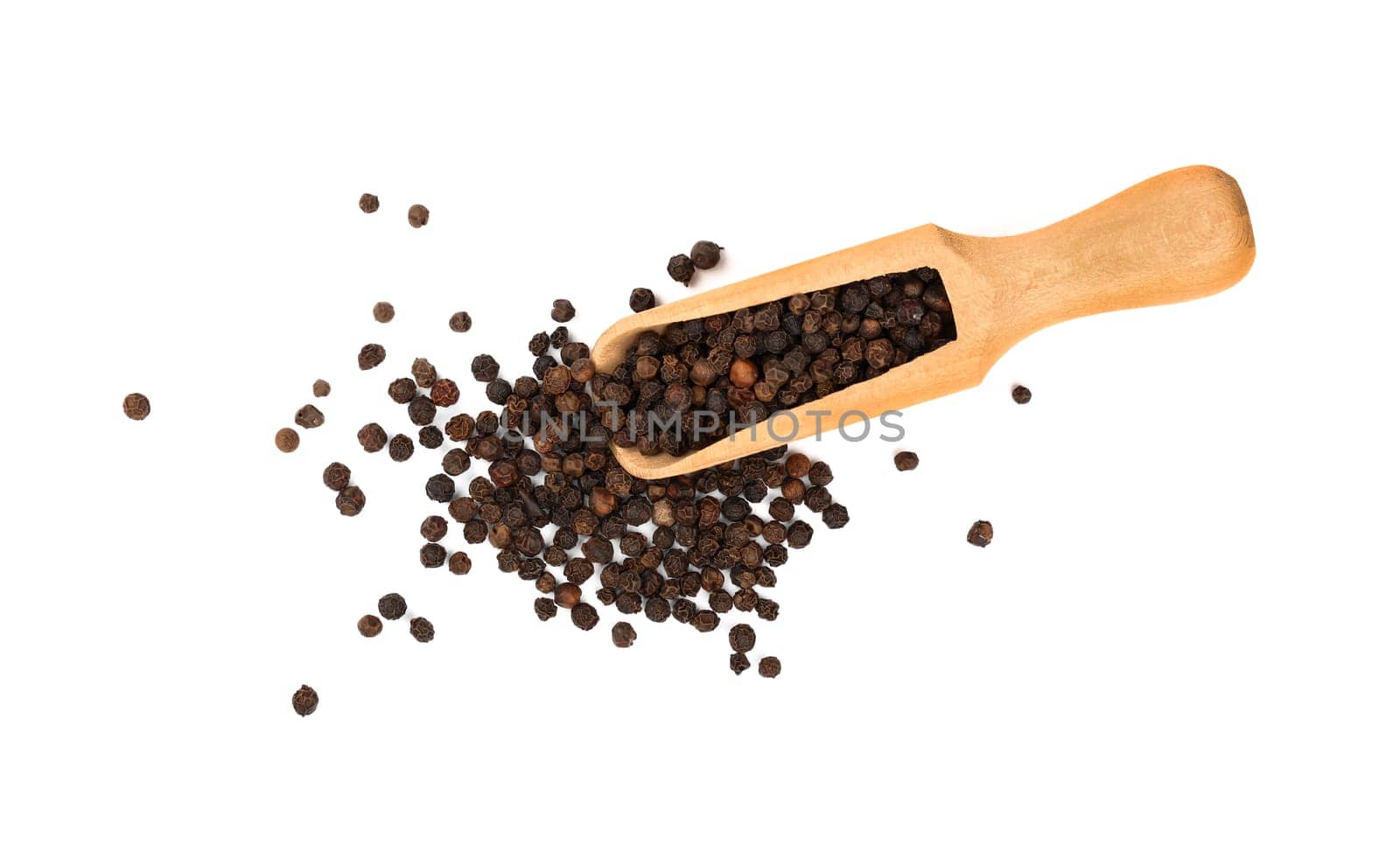 Close up one wooden scoop full of black pepper peppercorns and heap of peppercorns spilled and spread around isolated on white background, elevated top view, directly above