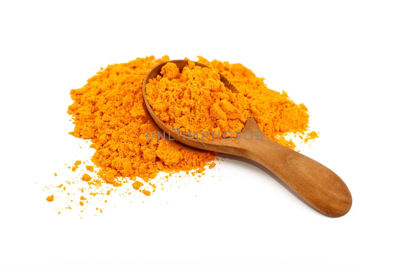 Wooden scoop spoon full of yellow turmeric powder by BreakingTheWalls