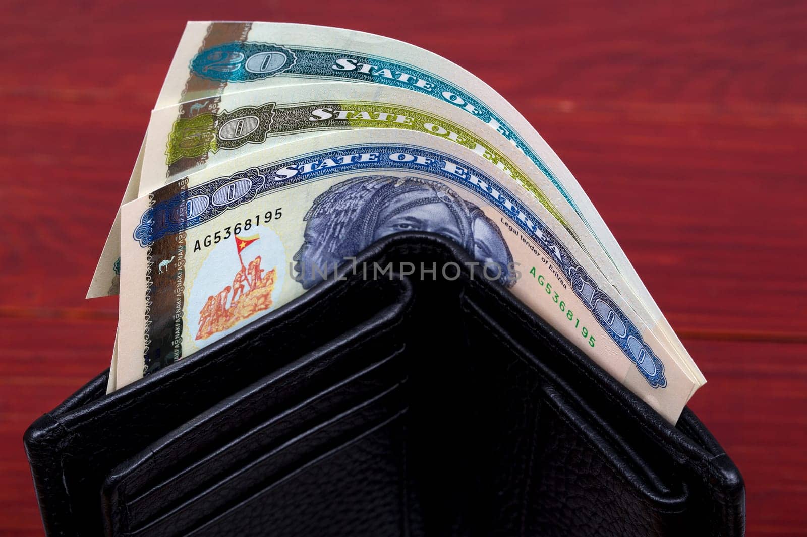 Eritrean money - Nakfa in a black wallet
