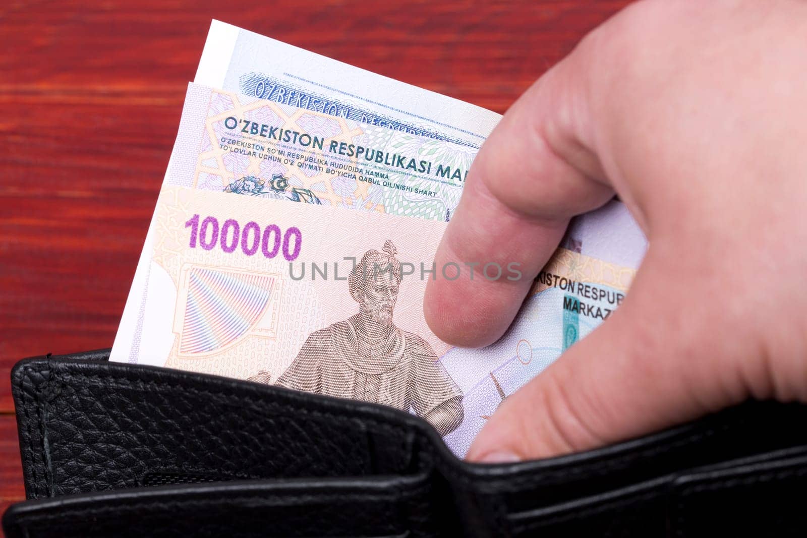 Uzbekistani money - som in the wallet by johan10