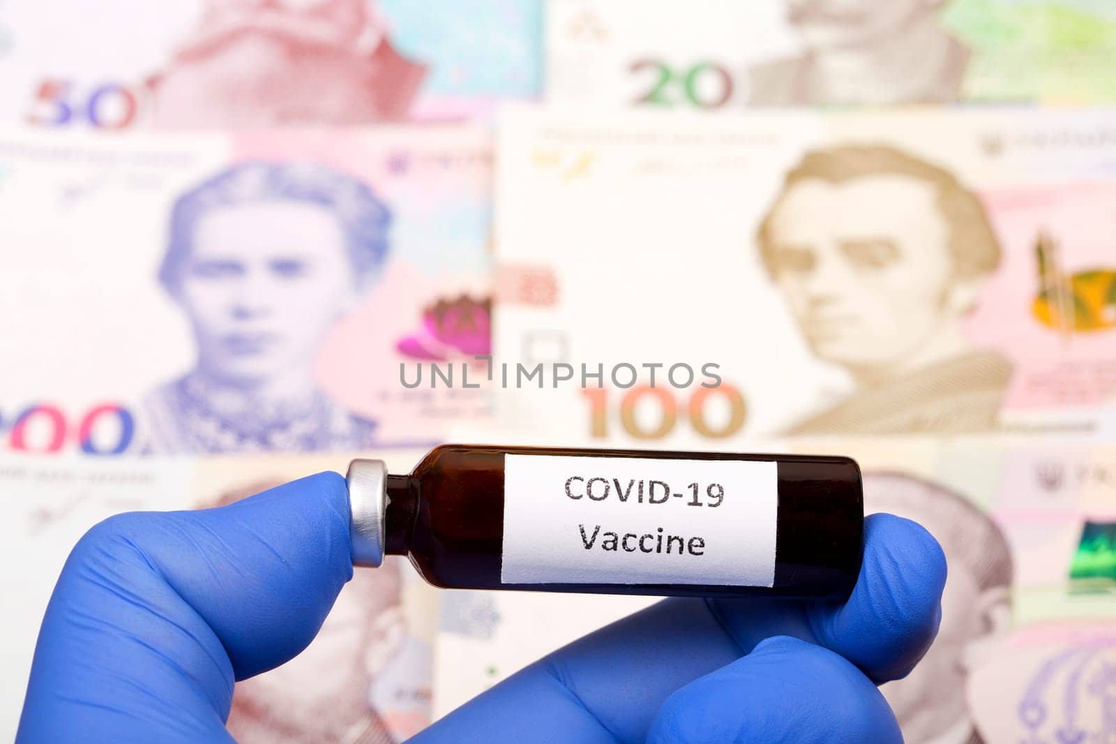 Vaccine against Covid-19 on the background of Ukrainian money by johan10