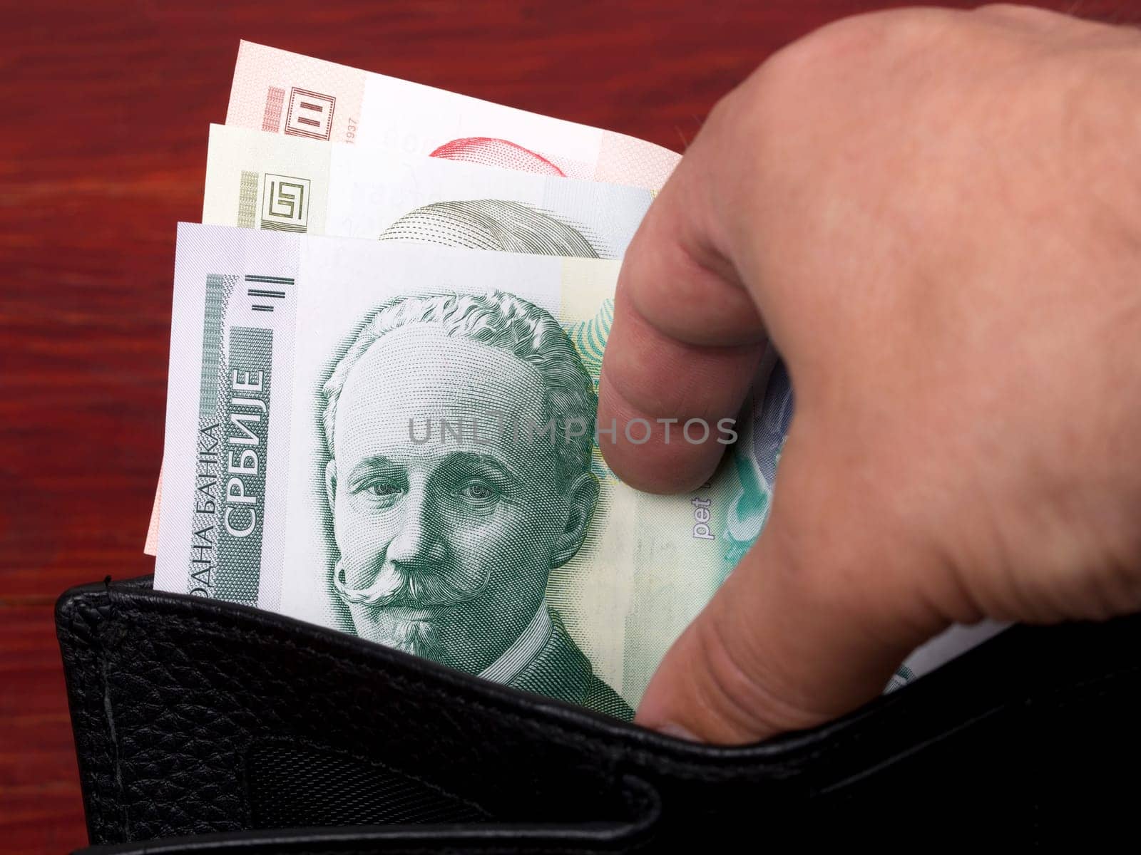 Serbian dinar in the black wallet