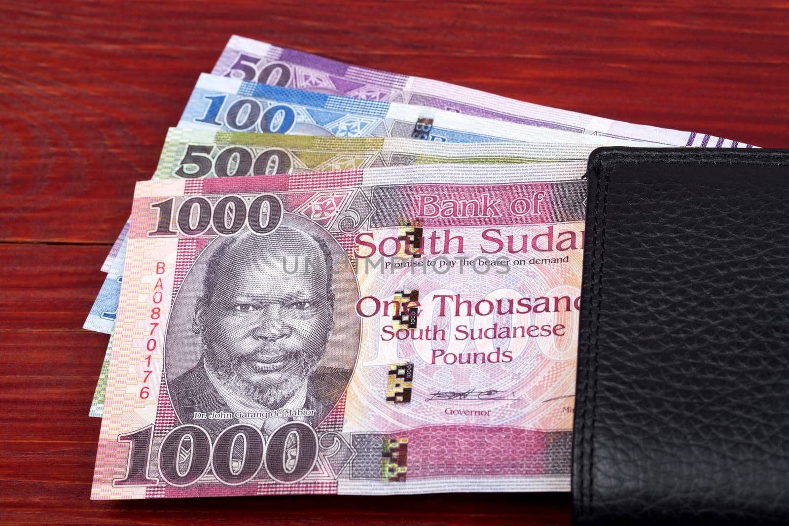 South Sudanese money in the black wallet