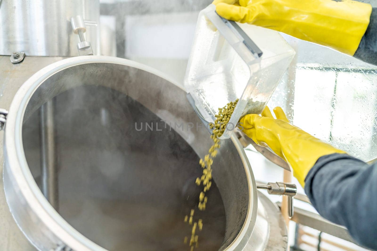 dried granulated hops in the brewery when brewing beer