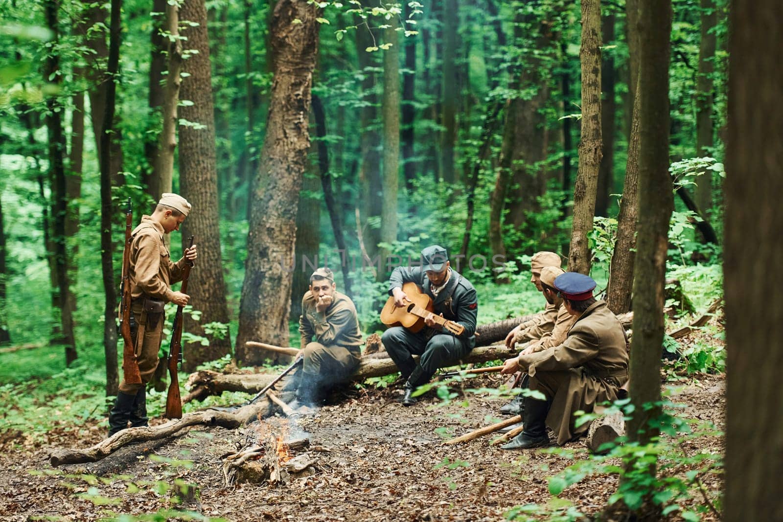 TERNOPIL, UKRAINE - June 2020 UPA Ukrainian Insurgent Army movie filming. Pictures of backstage. Soldiers taking a rest in the forest.