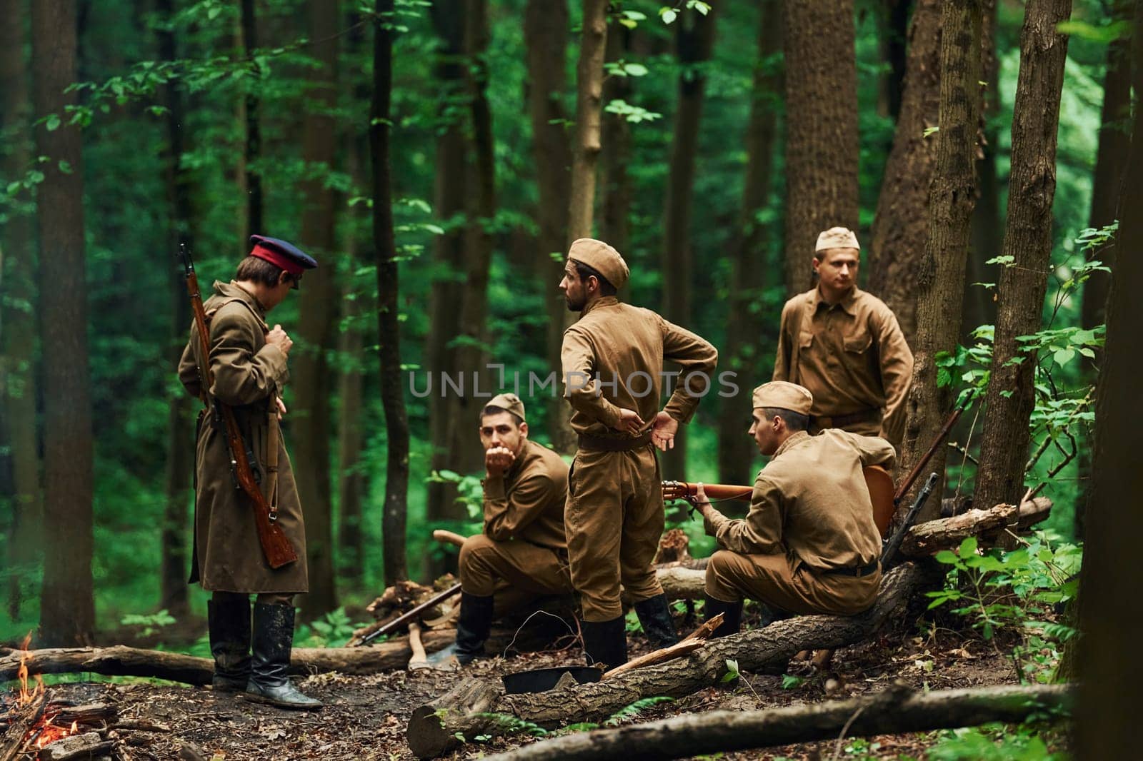 TERNOPIL, UKRAINE - June 2020 UPA Ukrainian Insurgent Army movie filming. Pictures of backstage. Soldiers taking a rest in the forest.