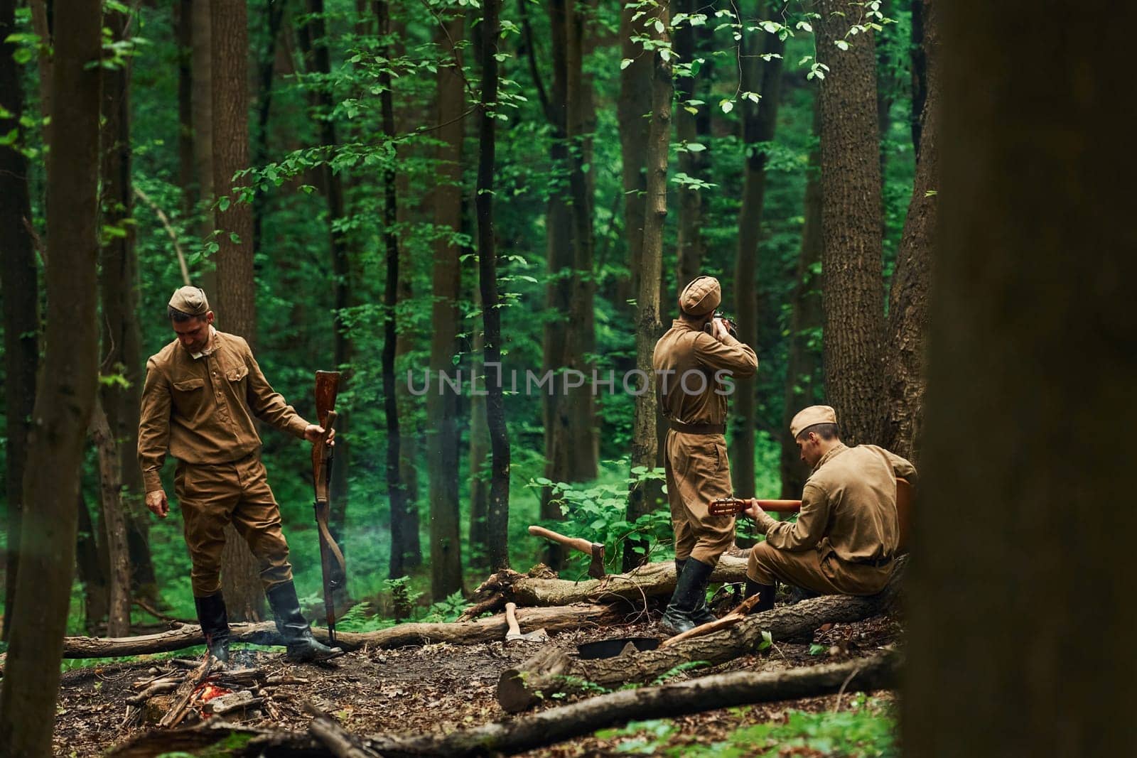 TERNOPIL, UKRAINE - June 2020 UPA Ukrainian Insurgent Army movie filming. Pictures of backstage. Soldiers taking a rest in the forest.