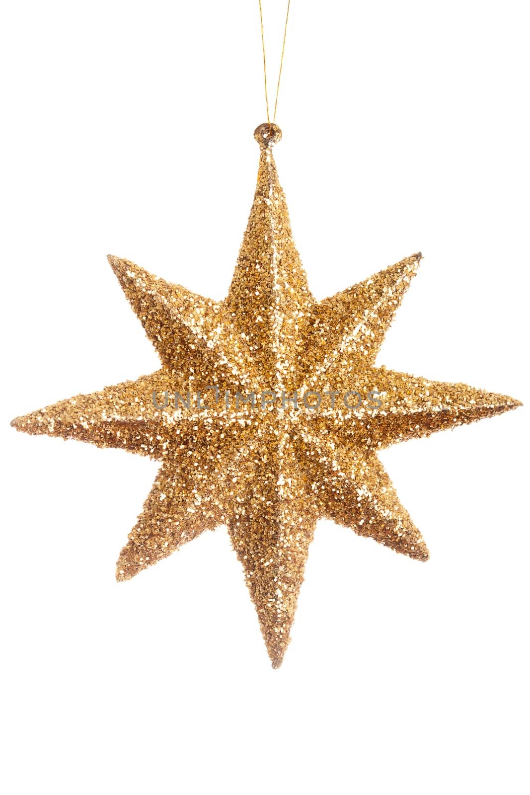 Christmas yellow shiny star isolated over white background by DCStudio