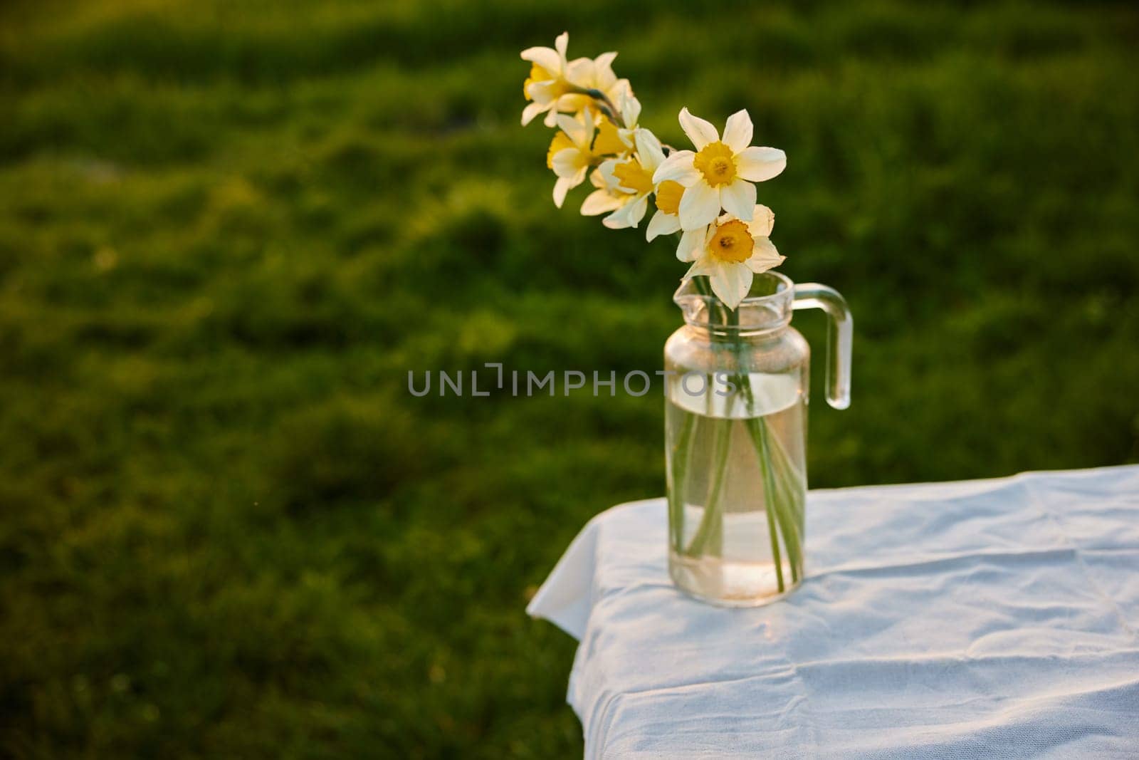 aesthetic photograph of daffodil bouquets standing on a street table. High quality photo