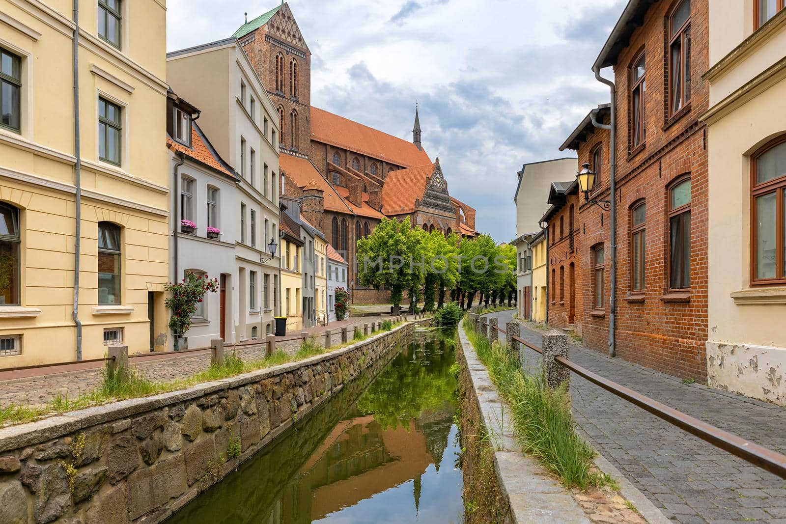 Wismar, Mill creek canal at Wismar, Germany, St Nicholas Church in the background