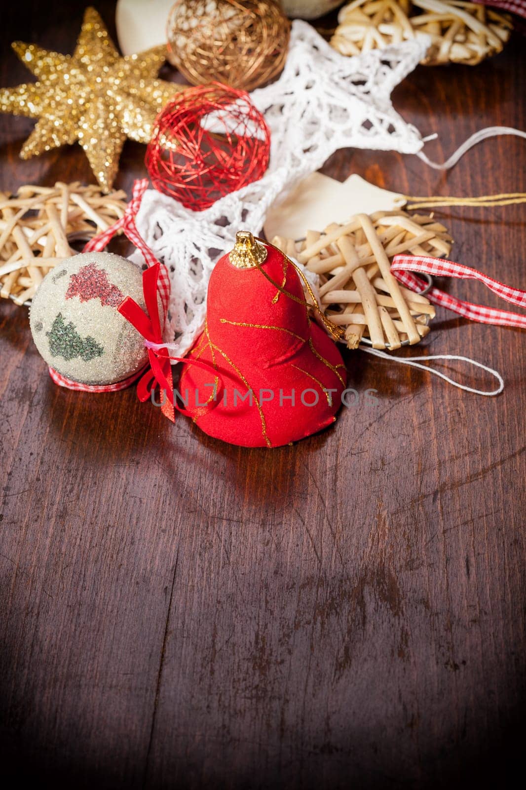 Different christmas decorations on wooden background with a vignete
