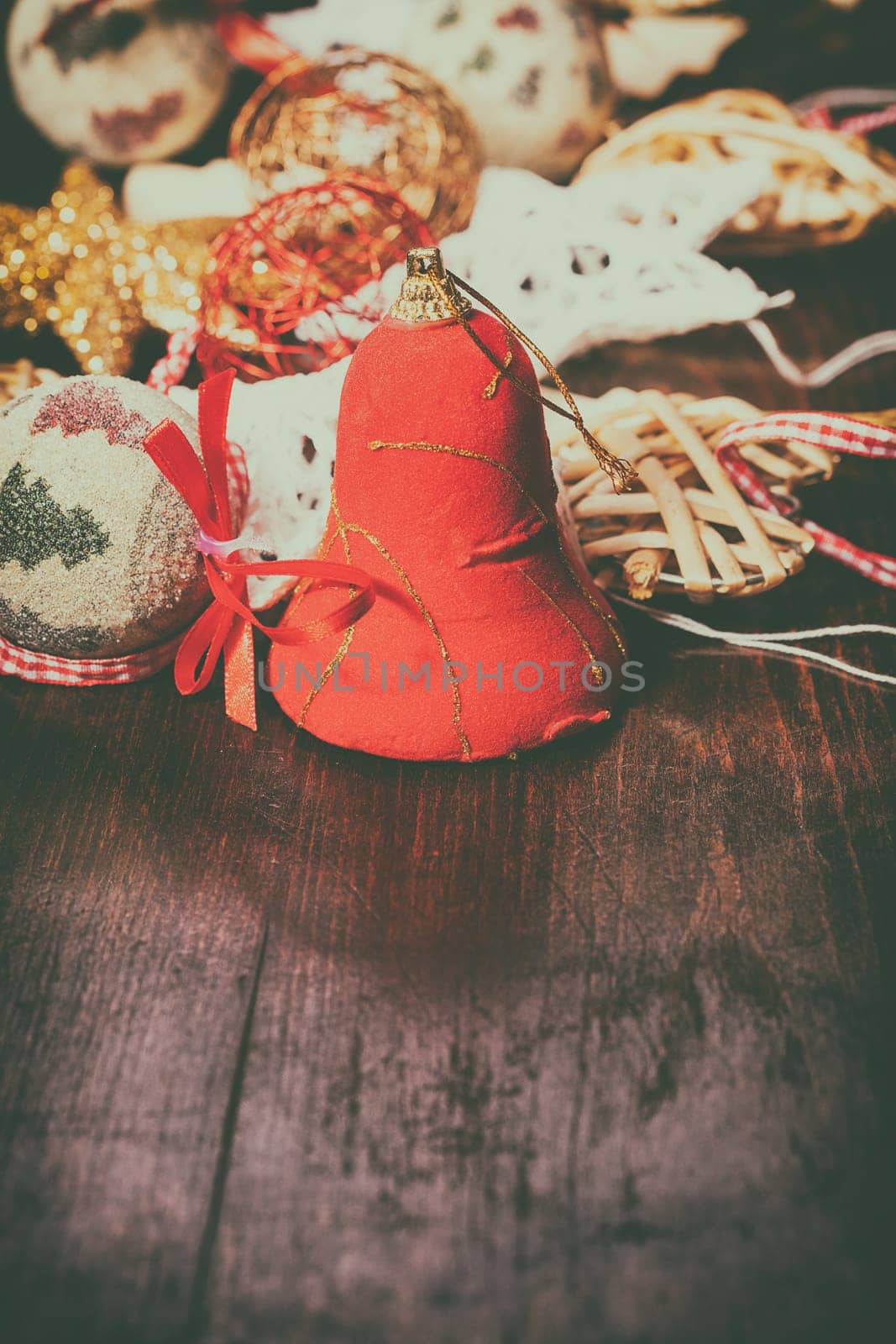 Decoration in vintage toning on wooden background. Xmas ornaments