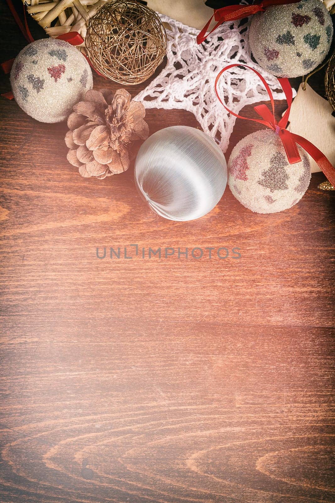 Christmas decorations on wooden background. Vintage toning. Winter decorations table