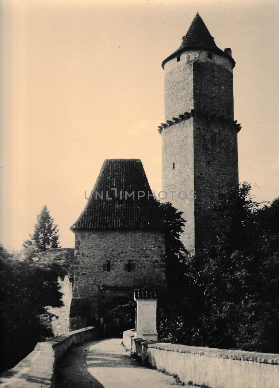 Retro photo shows a view of the medieval castle. Black and white vintage photography by roman_nerud