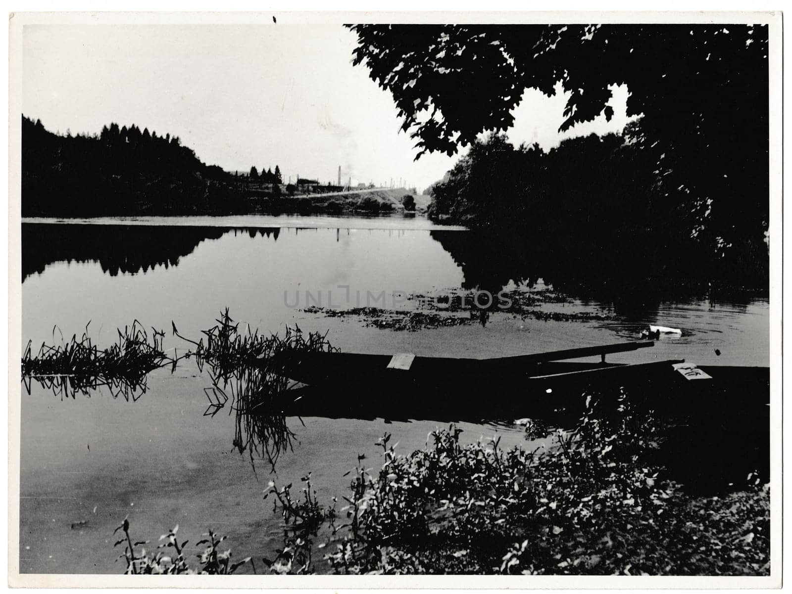 THE CZECHOSLOVAK SOCIALIST REPUBLIC - CIRCA 1960s: Retro photo shows view on the lake. Black & white vintage photography