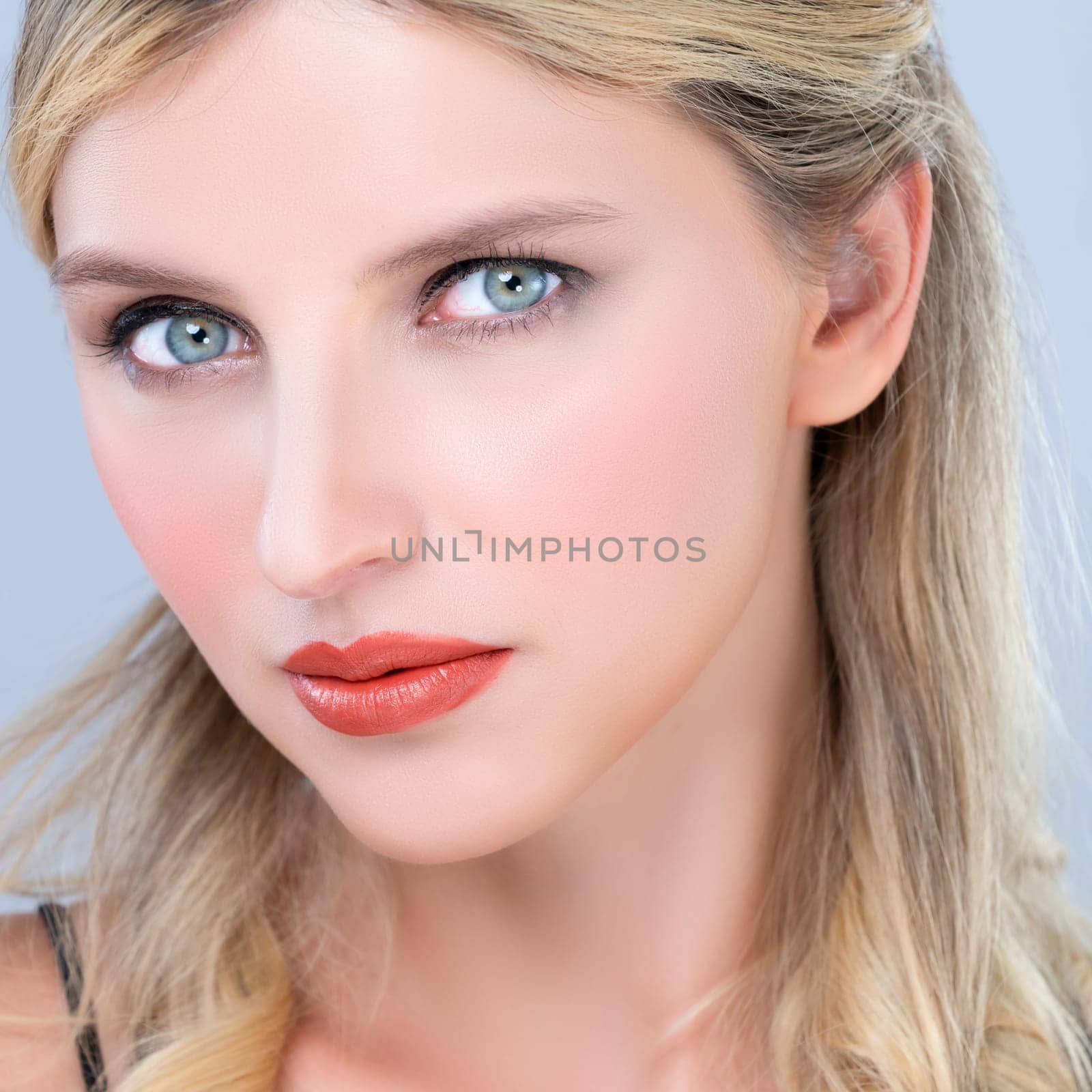Closeup pretty beautiful woman with alluring perfect smooth and clean skin portrait in isolated background. Hand gesture with expressive facial expression for beauty model concept.
