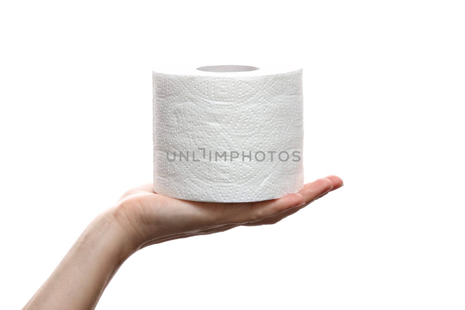 Close-up of a woman hand using toilet paper isolated on a white background. Hand holding roll of tissue paper. white roll toilet paper on female hand