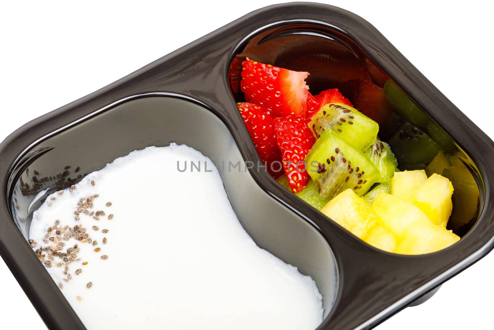Portion of yogurt dessert with strawberries, kiwi and pineapple in a plastic bowl. High quality photo.