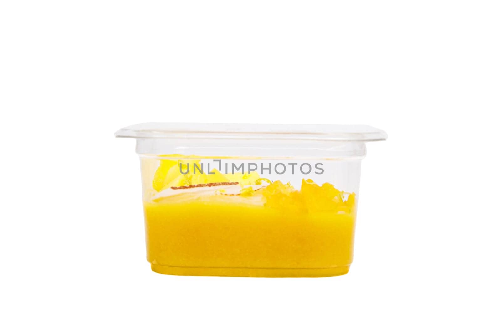 Smoothies with fresh fruits and nuts. Smoothie bowl, mango, passion fruit, coconut. Applesauce, lemon zest. High quality photo. Side view.