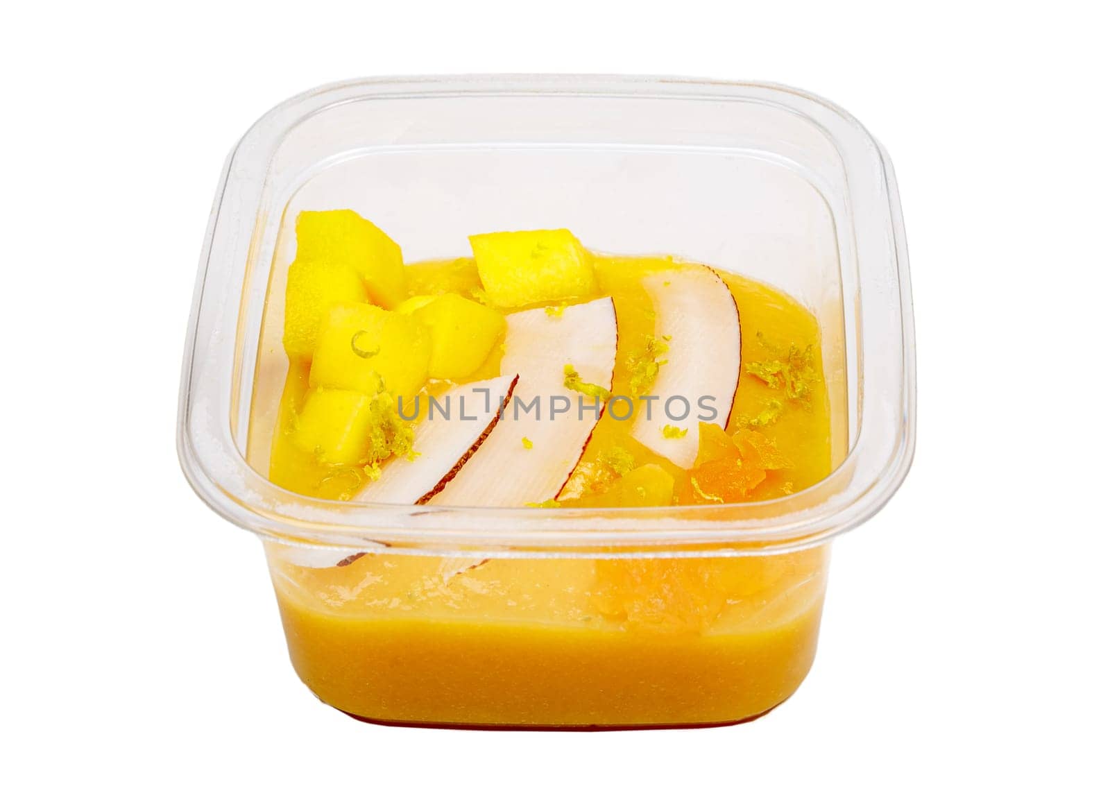 Smoothies with fresh fruits and nuts. Smoothie bowl, mango, passion fruit, coconut. Applesauce, lemon zest. High quality photo.