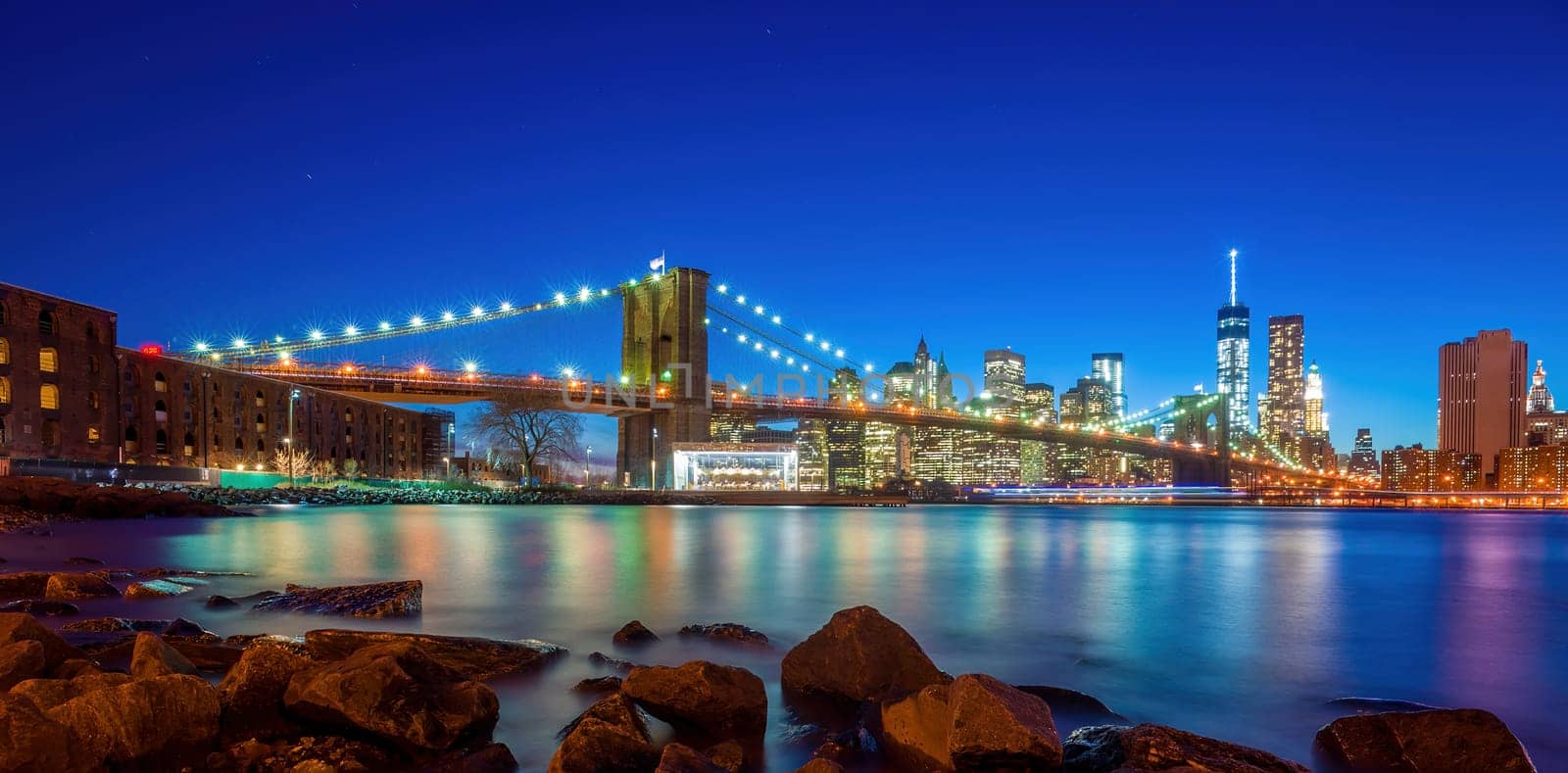 Manhattan city skyline cityscape of New York with Brooklyn Bridge  by f11photo