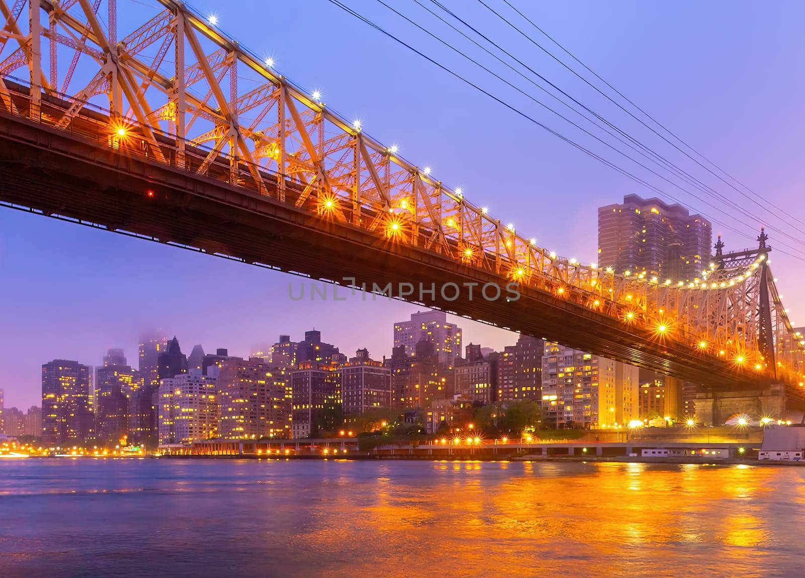 Manhattan city skyline cityscape of New York with Queen Bridge in USA