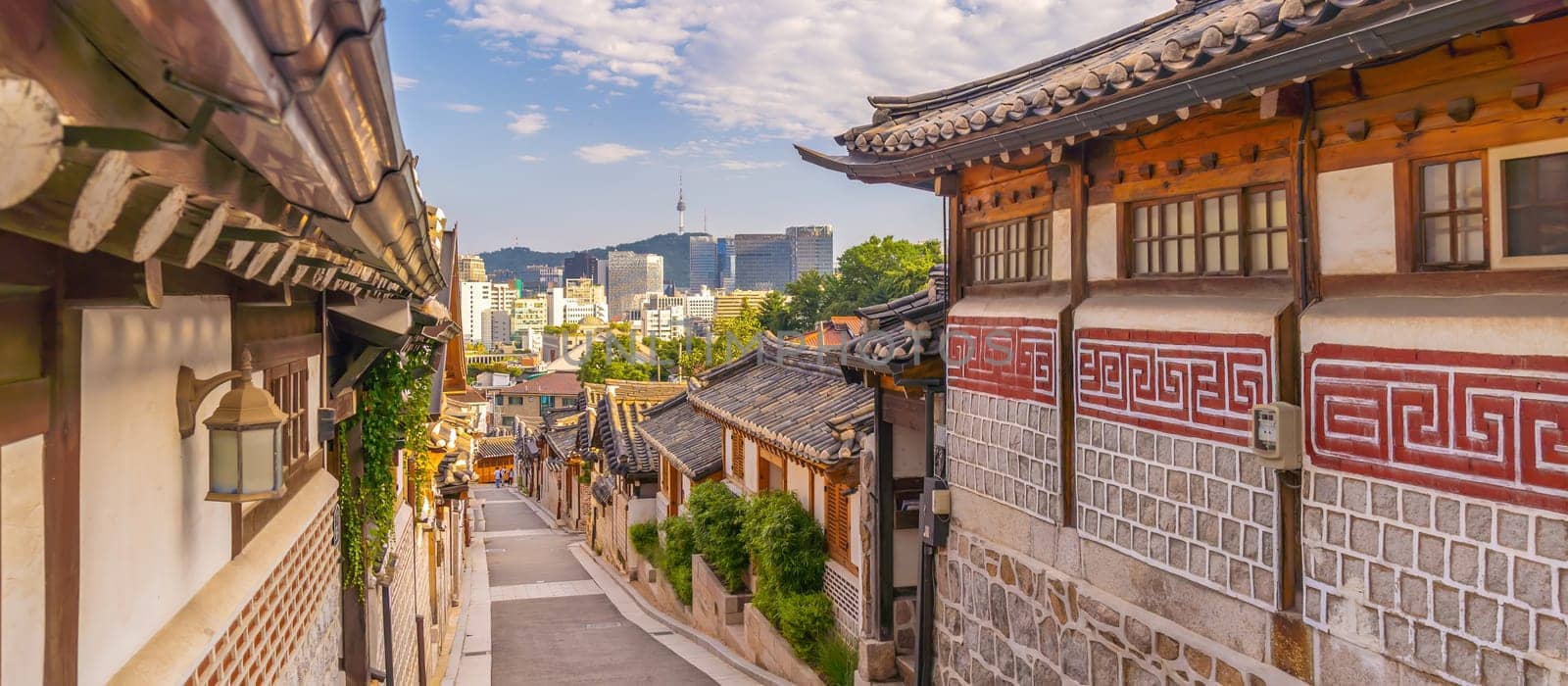 Bukchon Hanok Village with Seoul city skyline, cityscape South Korea  by f11photo