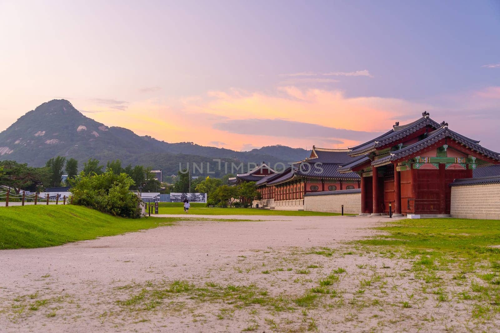 Gyeongbokgung Palace in downtown Seoul at sunset  by f11photo
