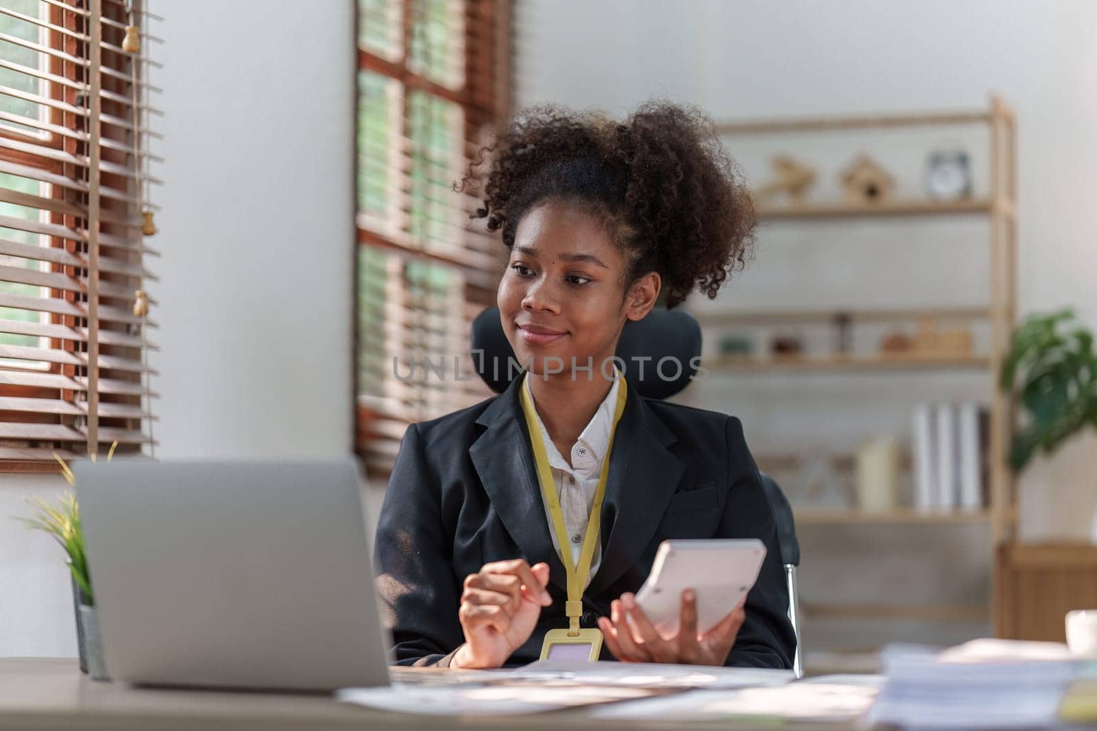 Accountant black woman working on laptop and do document, tax, exchange, accounting and Financial advisor concept.