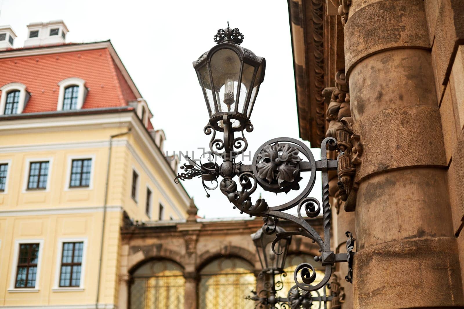 An old Baroque street lamp illuminating the palace grounds by Try_my_best