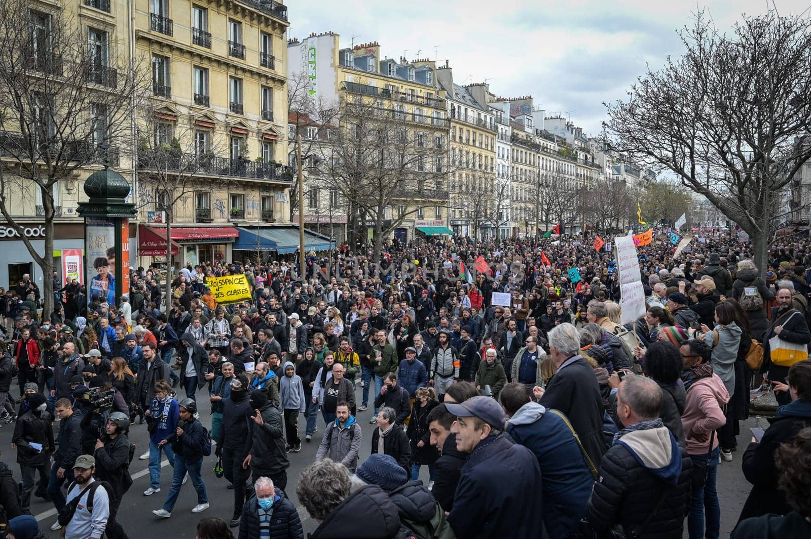 France, Paris, 2023-03-23. Demonstration, Strike, Ninth day of mobilisation against the pension reform. The Parisian procession, near Republique Place, High quality photo