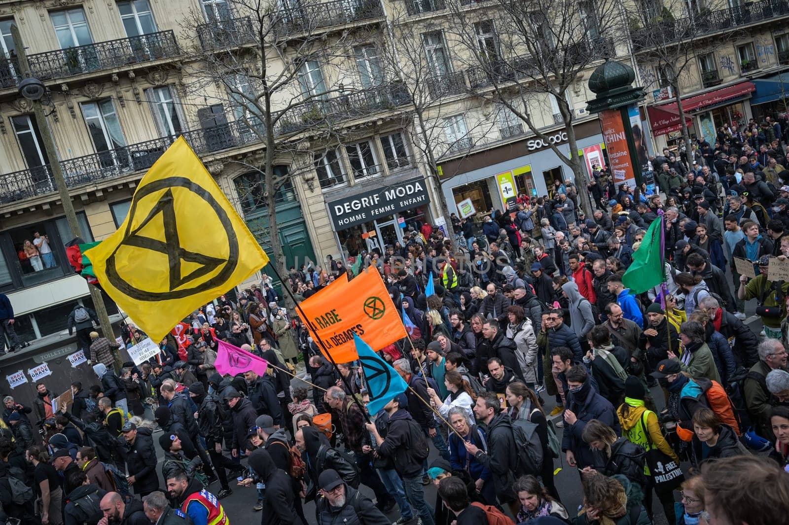 France, Paris, 2023-03-23. Demonstration, Strike, Ninth day of mobilisation against the pension reform. The Parisian procession, near Republique Place, High quality photo