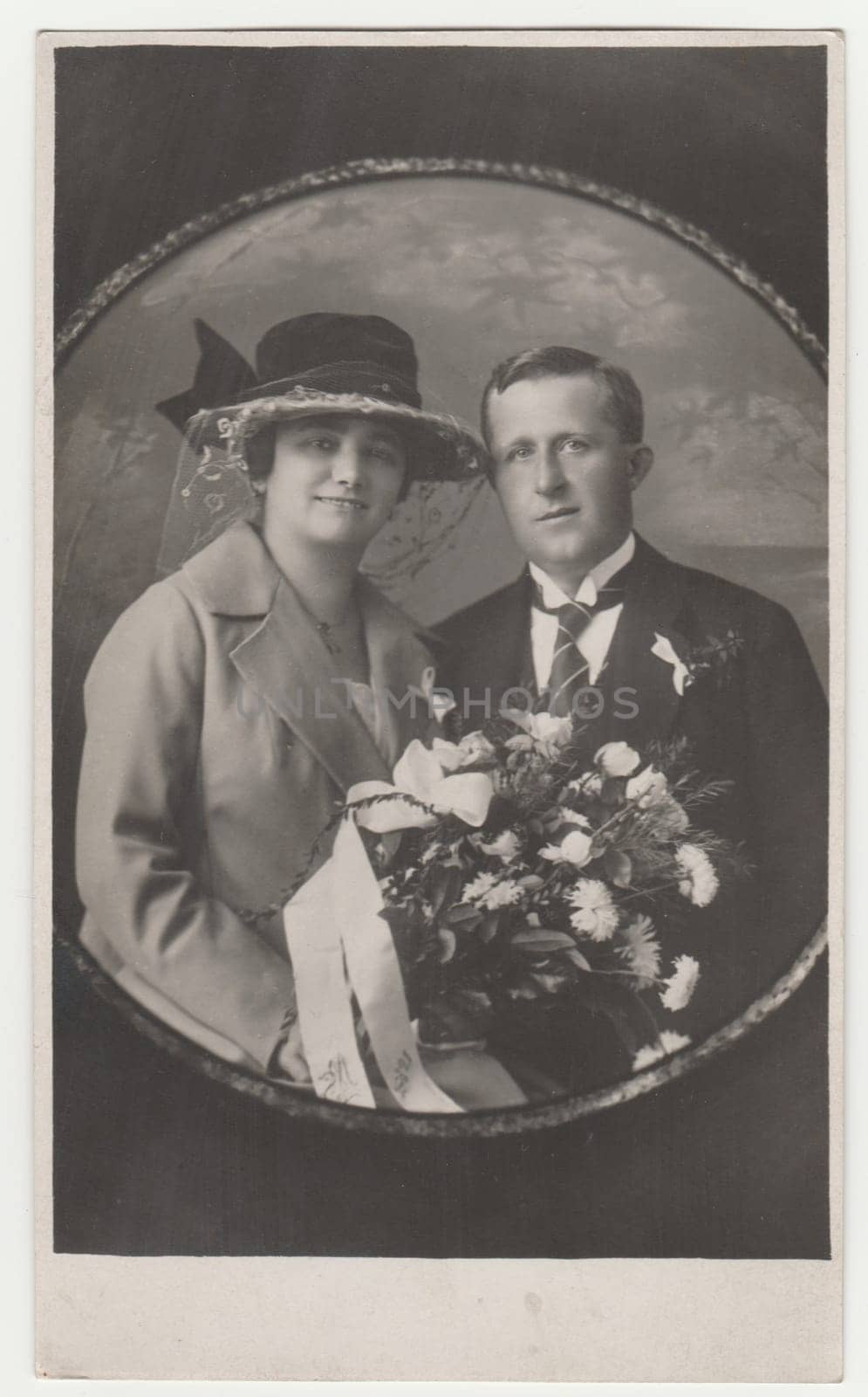Vintage photo shows newlyweds. Photography is round shaped. Retro black and white photography. by roman_nerud