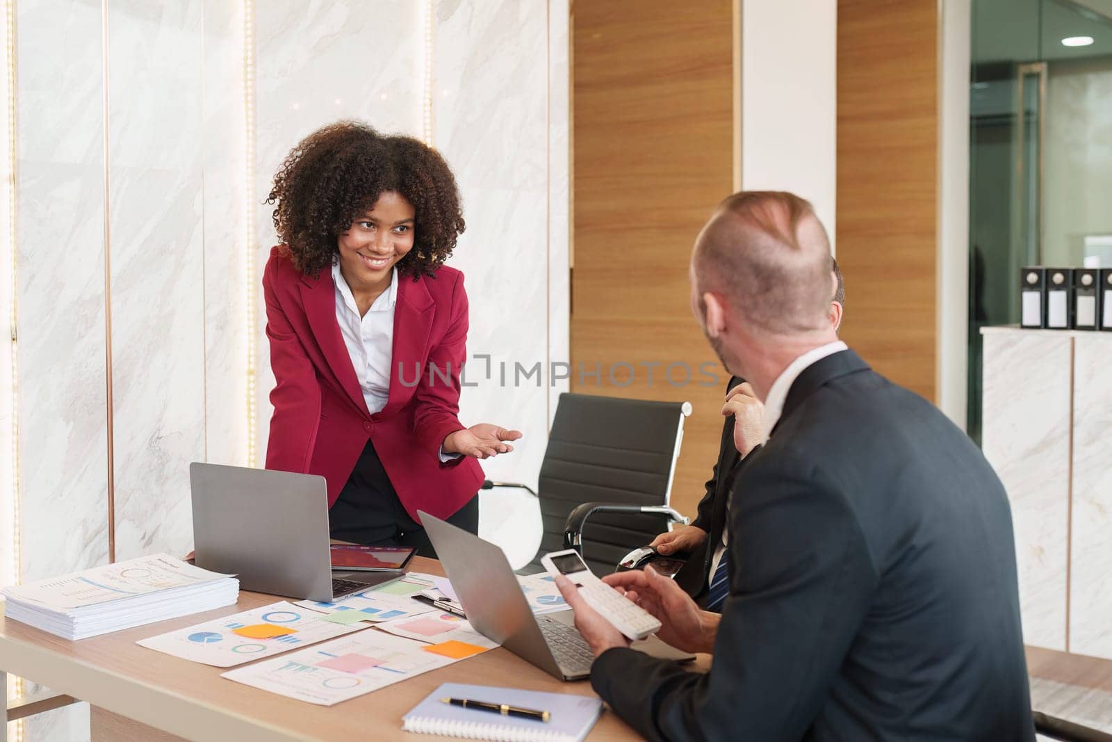 Diverse Multiethnic Business people in meeting. Accountant people do paperwork, tax, accounting and Financial advisor concept.