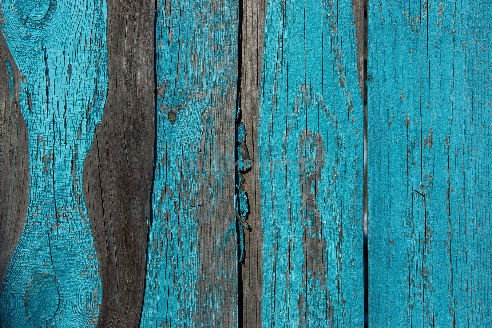 Old painted blue boards of the old fence by Севостьянов